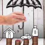 hand-with-a-drawn-umbrella-and-coins_1134-144