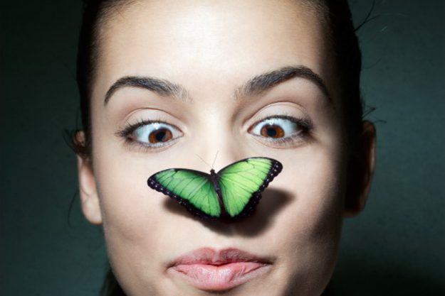 female-with-butterfly-on-nose_1301-791