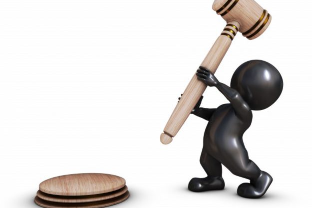 person-with-a-court-hammer_1048-1720